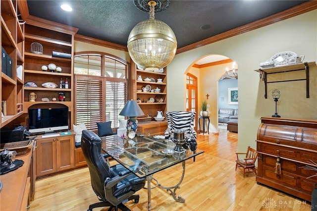 1129 Green Tree Rd, Centerville, OH 45429 - home office with crown molding, arched walkways, and light wood-type flooring
