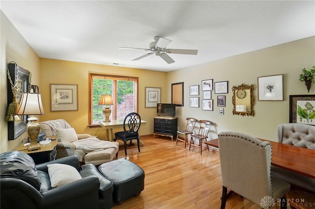 1129 Green Tree Rd, Centerville, OH 45429 - living area with ceiling fan and light wood-type flooring