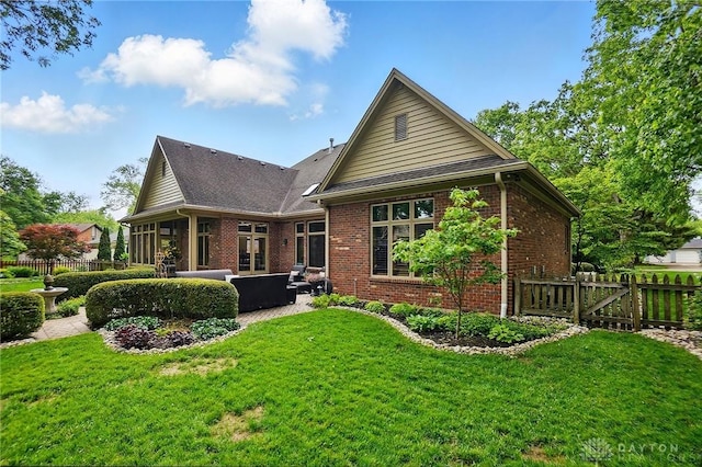 1129 Green Tree Rd, Centerville, OH 45429 - rear view of house featuring brick siding, outdoor lounge area, a patio, and roof with shingles