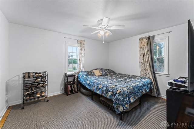 1012 W Sparrow Rd, Springfield, OH 45502 - bedroom featuring baseboards and a ceiling fan