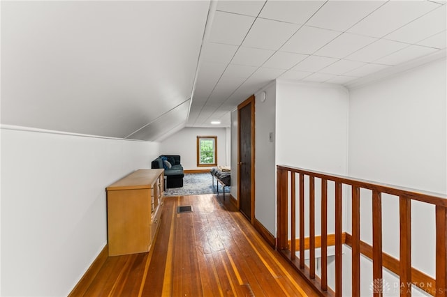 1012 W Sparrow Rd, Springfield, OH 45502 - additional living space featuring dark wood-style floors, baseboards, and lofted ceiling