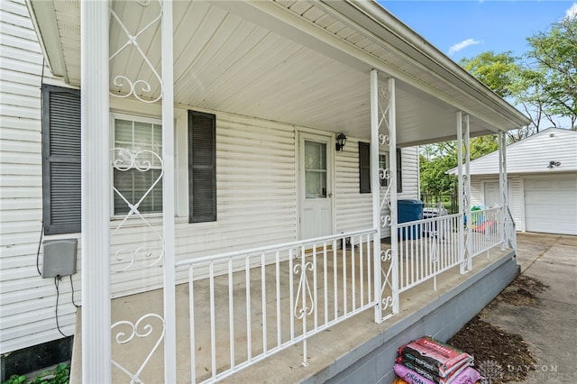 1012 W Sparrow Rd, Springfield, OH 45502 - entrance to property with covered porch and a garage