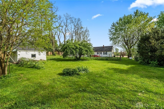1012 W Sparrow Rd, Springfield, OH 45502 - view of green lawn featuring an outbuilding