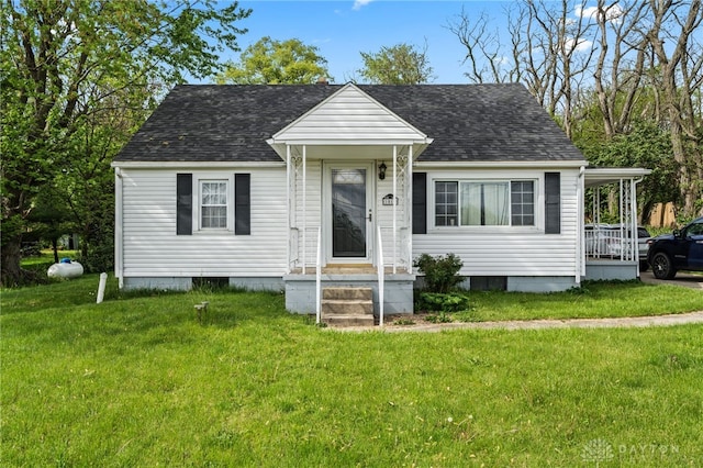 1012 W Sparrow Rd, Springfield, OH 45502 - view of front facade featuring a front lawn and a shingled roof