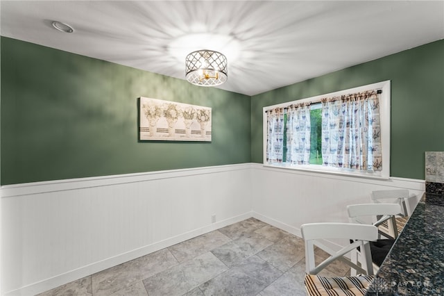 1012 W Sparrow Rd, Springfield, OH 45502 - unfurnished dining area with wainscoting