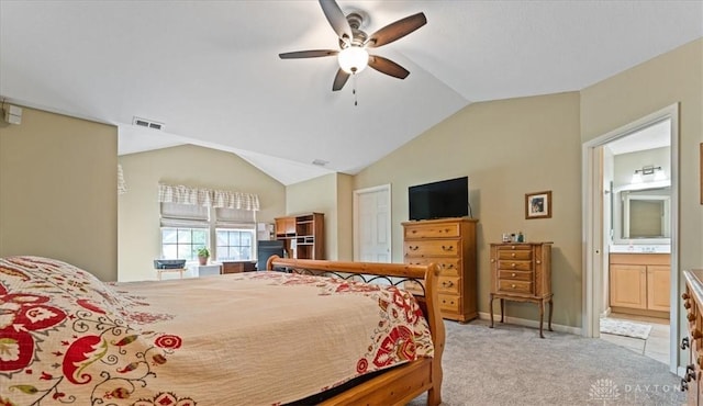 1422 Shawnee Run Dr, Maineville, OH 45039 - bedroom featuring lofted ceiling, light colored carpet, baseboards, ensuite bath, and a ceiling fan