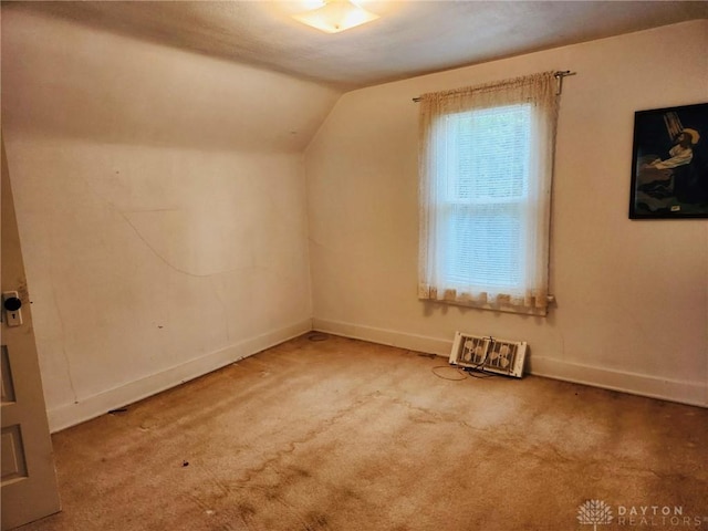 211 Nordale Ave, Dayton, OH 45420 - additional living space featuring carpet, lofted ceiling, and baseboards