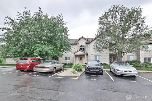 1690 Piper Ln Unit 206, Washington Twp, OH 45440 - view of front facade with uncovered parking