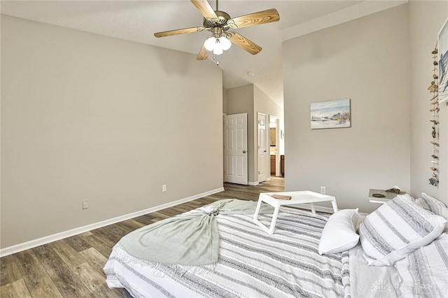 1690 Piper Ln Unit 206, Washington Twp, OH 45440 - bedroom featuring wood finished floors, baseboards, connected bathroom, and a ceiling fan