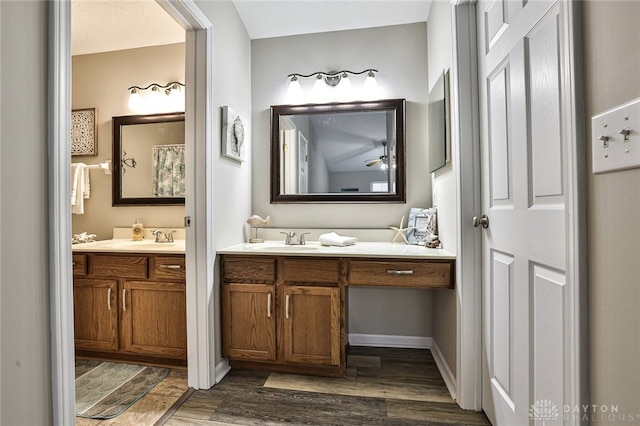 1690 Piper Ln Unit 206, Washington Twp, OH 45440 - bathroom with vanity and wood finished floors