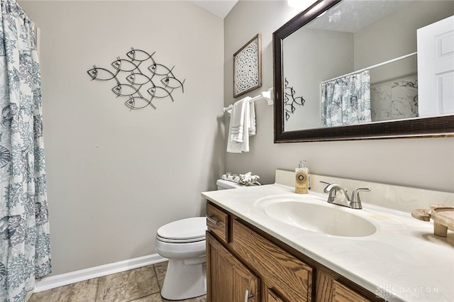 1690 Piper Ln Unit 206, Washington Twp, OH 45440 - full bath with vanity, toilet, baseboards, and a shower with curtain