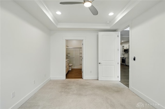 641 Angler Ct, Beavercreek, OH 45430 - unfurnished bedroom featuring ornamental molding, carpet flooring, a raised ceiling, baseboards, and ensuite bathroom