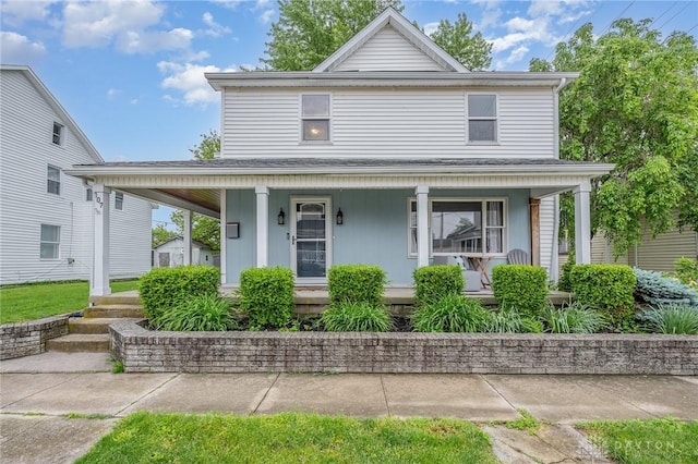 107 S High St, Arcanum, OH 45304 - view of front of property featuring a porch