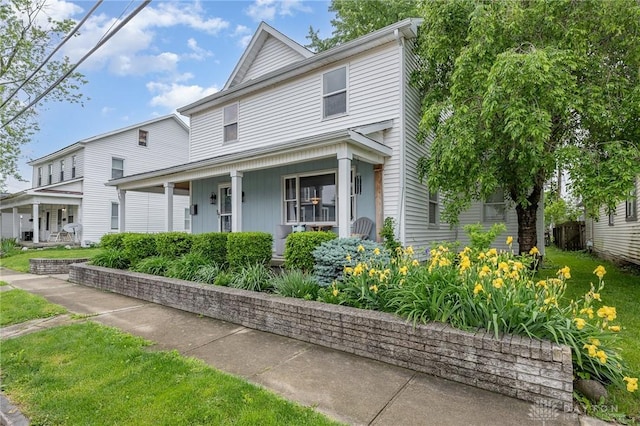 107 S High St, Arcanum, OH 45304 - view of front of home with covered porch