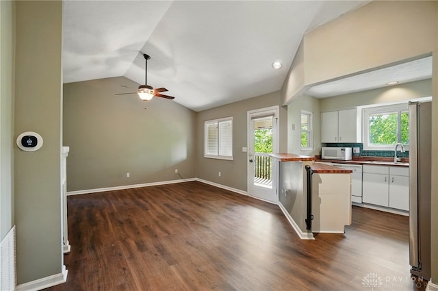 1175 Captains Brg, Dayton, OH 45458 - kitchen with wood counters, white appliances, vaulted ceiling, white cabinets, and a ceiling fan
