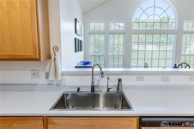 1233 Terrington Way, Miamisburg, OH 45342 - kitchen featuring dishwasher, a sink, light countertops, and vaulted ceiling