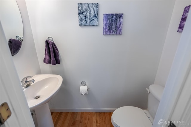 1233 Terrington Way, Miamisburg, OH 45342 - bathroom featuring wood finished floors, toilet, and baseboards