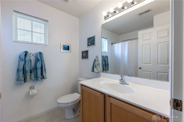 1233 Terrington Way, Miamisburg, OH 45342 - full bathroom with toilet, vanity, baseboards, and tile patterned floors
