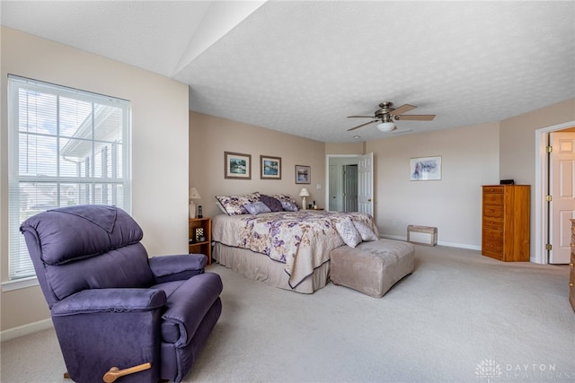 1233 Terrington Way, Miamisburg, OH 45342 - bedroom featuring light carpet, multiple windows, baseboards, and a textured ceiling