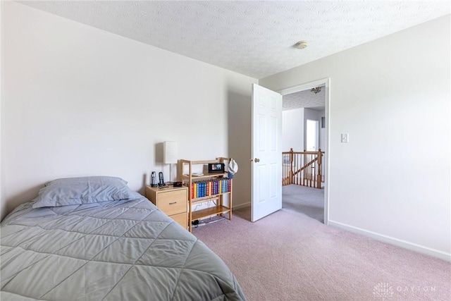 1233 Terrington Way, Miamisburg, OH 45342 - carpeted bedroom featuring baseboards and a textured ceiling