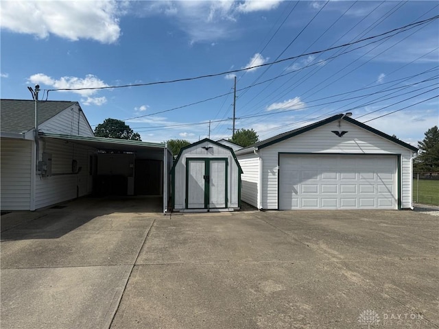 409 Skyview Dr, Vandalia, OH 45377 - detached garage with a carport and a storage unit