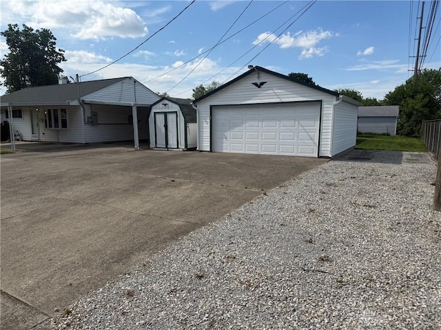 409 Skyview Dr, Vandalia, OH 45377 - detached garage featuring a storage unit