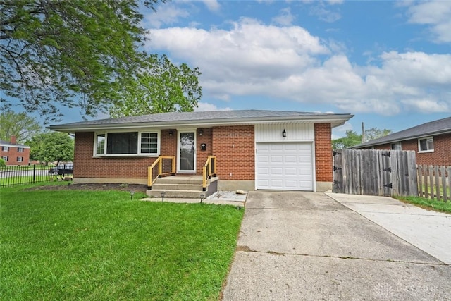 1525 Forrer Blvd, Kettering, OH 45420 - single story home with an attached garage, concrete driveway, and brick siding