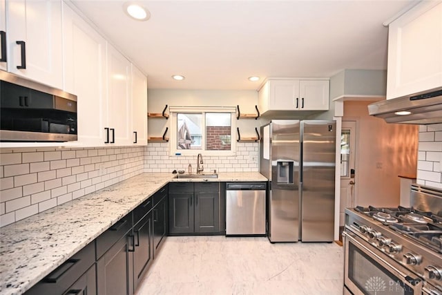 1525 Forrer Blvd, Kettering, OH 45420 - kitchen with stainless steel appliances, a sink, open shelves, white cabinetry, and tasteful backsplash