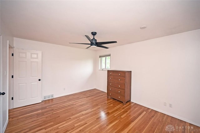 1525 Forrer Blvd, Kettering, OH 45420 - unfurnished bedroom with light wood-type flooring, baseboards, and a ceiling fan