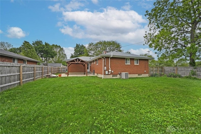 1525 Forrer Blvd, Kettering, OH 45420 - back of house featuring central AC, brick siding, a gazebo, and a patio area