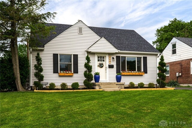 3227 Mirimar St, Dayton, OH 45409 - cape cod-style house with roof with shingles and a front yard