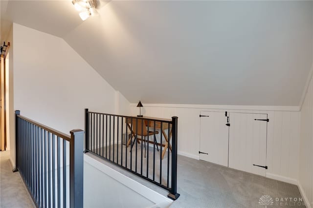 3227 Mirimar St, Dayton, OH 45409 - staircase featuring vaulted ceiling and carpet floors