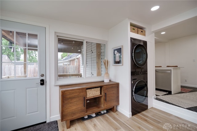 3227 Mirimar St, Dayton, OH 45409 - washroom with stacked washing machine and dryer, baseboards, light wood-style floors, and recessed lighting