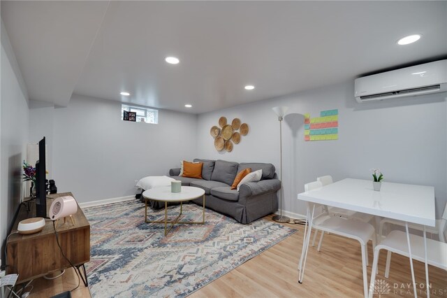 3227 Mirimar St, Dayton, OH 45409 - living area featuring a wall mounted air conditioner, wood finished floors, recessed lighting, and baseboards