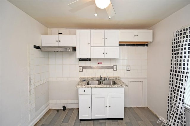932 Crestmore Ave, Dayton, OH 45402 - kitchen featuring a sink, dark wood finished floors, a ceiling fan, and white cabinetry
