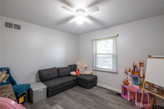 2155 Shenandoah Dr, Troy, OH 45373 - living room with wood finished floors, ceiling fan, and baseboards