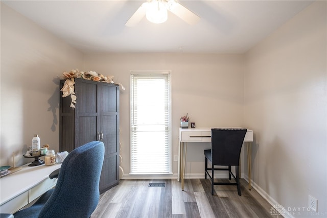 2155 Shenandoah Dr, Troy, OH 45373 - office with wood finished floors, a ceiling fan, and baseboards