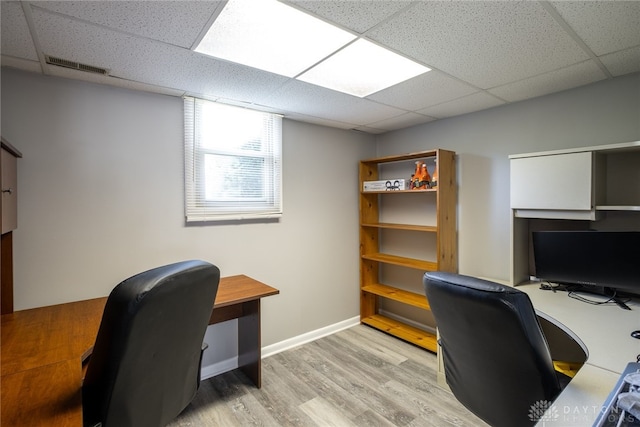 2155 Shenandoah Dr, Troy, OH 45373 - office area featuring light wood-style flooring, a drop ceiling, and baseboards