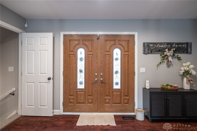 2155 Shenandoah Dr, Troy, OH 45373 - entrance foyer with dark wood finished floors and baseboards