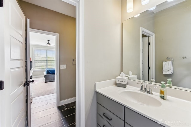 3886 Hudson Hills Ln, Mason, OH 45040 - bathroom with vanity, baseboards, tile patterned floors, and ceiling fan