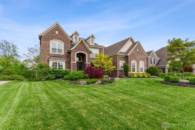 3886 Hudson Hills Ln, Mason, OH 45040 - traditional-style home featuring brick siding and a front lawn