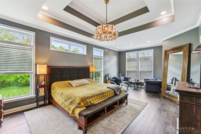 3886 Hudson Hills Ln, Mason, OH 45040 - bedroom featuring ornamental molding, a chandelier, hardwood / wood-style flooring, and multiple windows