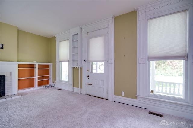 5894 Hamilton Lebanon Rd, Monroe, OH 45044 - carpeted entryway featuring a fireplace and baseboards
