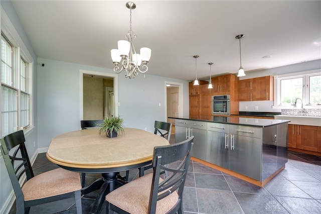 5894 Hamilton Lebanon Rd, Monroe, OH 45044 - dining room with a chandelier and baseboards