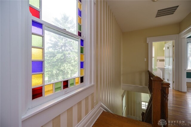 5894 Hamilton Lebanon Rd, Monroe, OH 45044 - hall with plenty of natural light and wood finished floors