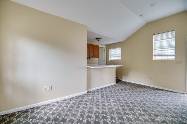 5894 Hamilton Lebanon Rd, Monroe, OH 45044 - unfurnished room featuring lofted ceiling, baseboards, carpet floors, and a smoke detector