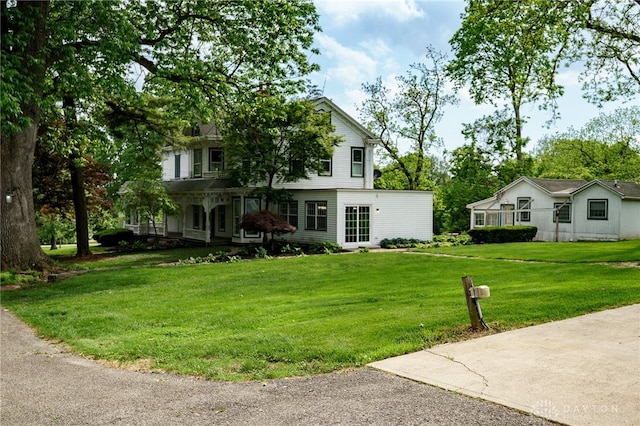 5894 Hamilton Lebanon Rd, Monroe, OH 45044 - rear view of property with a yard and a porch