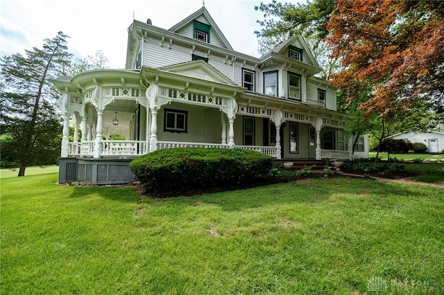 5894 Hamilton Lebanon Rd, Monroe, OH 45044 - victorian home featuring a porch and a front lawn