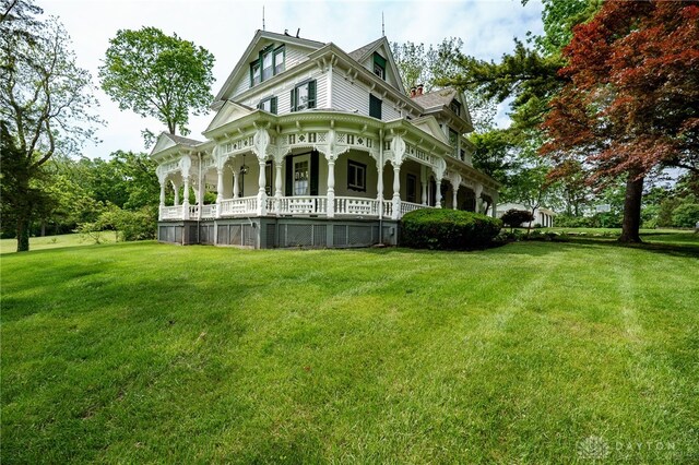 5894 Hamilton Lebanon Rd, Monroe, OH 45044 - view of front of house featuring a front lawn and covered porch
