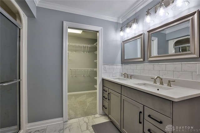 3085 State Route 122, Springboro, OH 45005 - bathroom with marble look tile flooring, double vanity, a spacious closet, crown molding, and baseboards